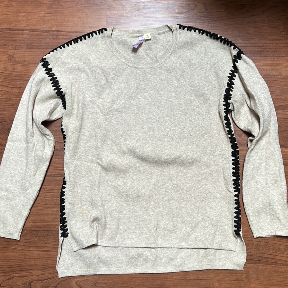 Francesca black stitching on cream sweater size M in mint condition
